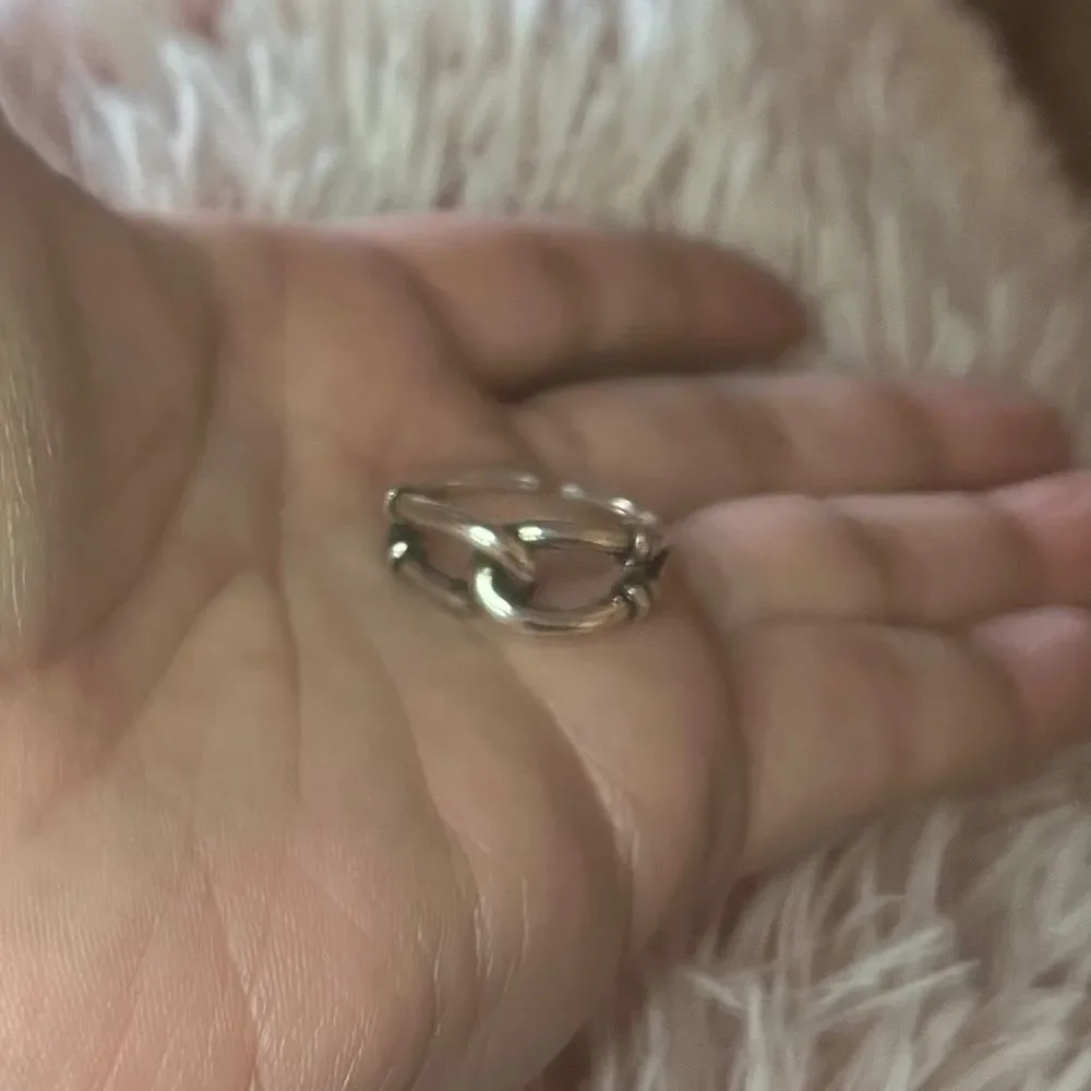 The Tie Me In Knots Ring, adjustable in 925 silver